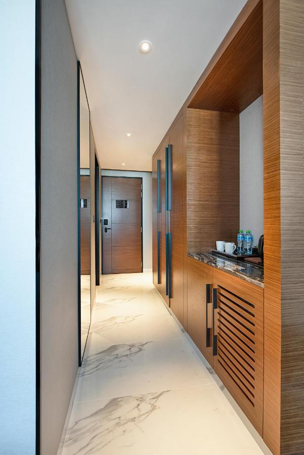 Asiana Grand Hotel Dubai Bagian luar foto A room at the hotel