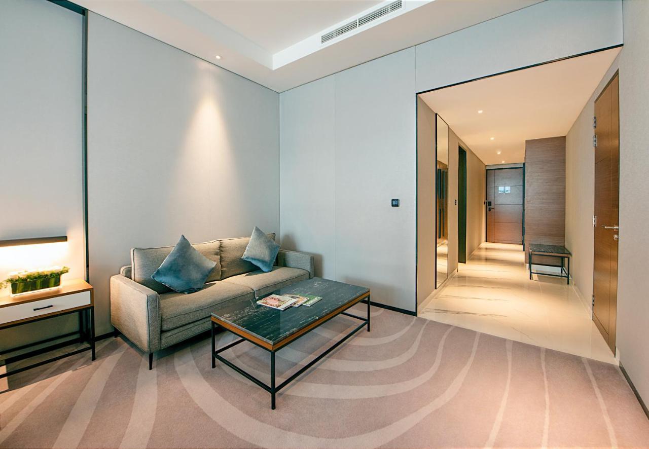 Asiana Grand Hotel Dubai Bagian luar foto A room at the hotel