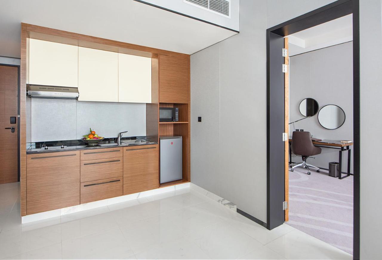 Asiana Grand Hotel Dubai Bagian luar foto A kitchenette in a hotel