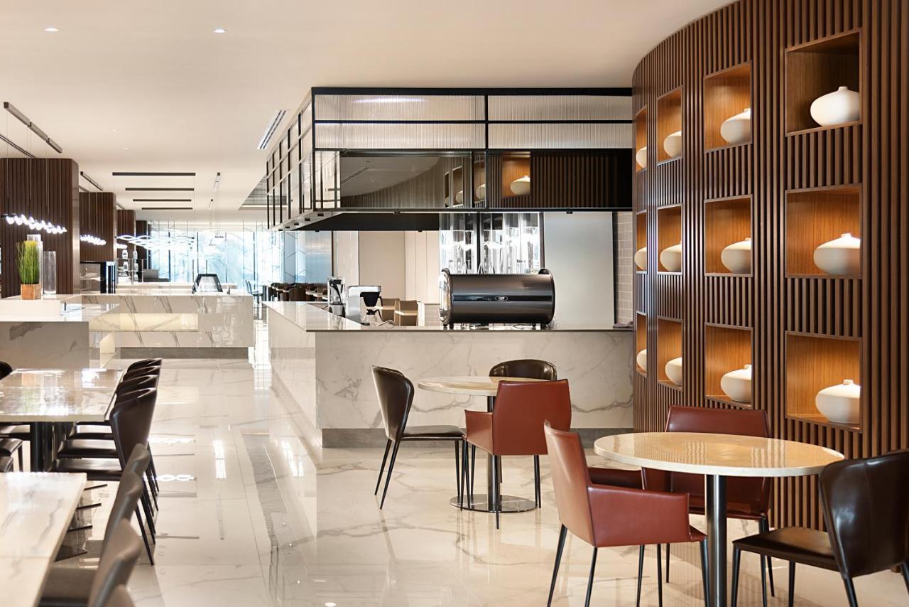 Asiana Grand Hotel Dubai Bagian luar foto The lounge at the airport