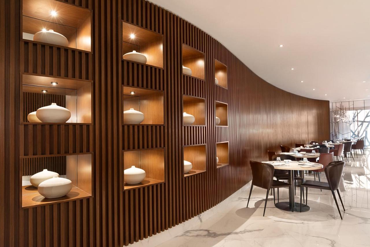 Asiana Grand Hotel Dubai Bagian luar foto Interior of the restaurant