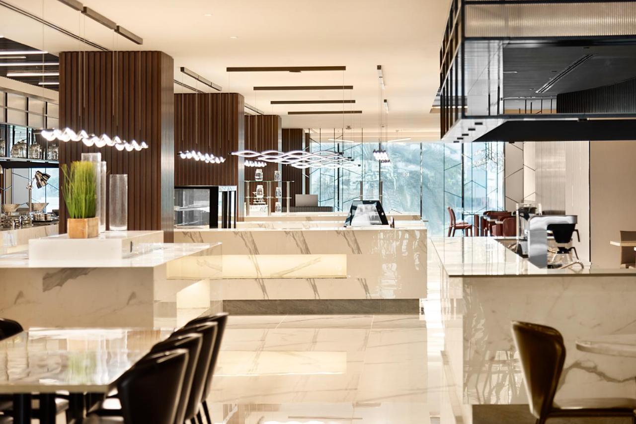 Asiana Grand Hotel Dubai Bagian luar foto The lounge at the airport