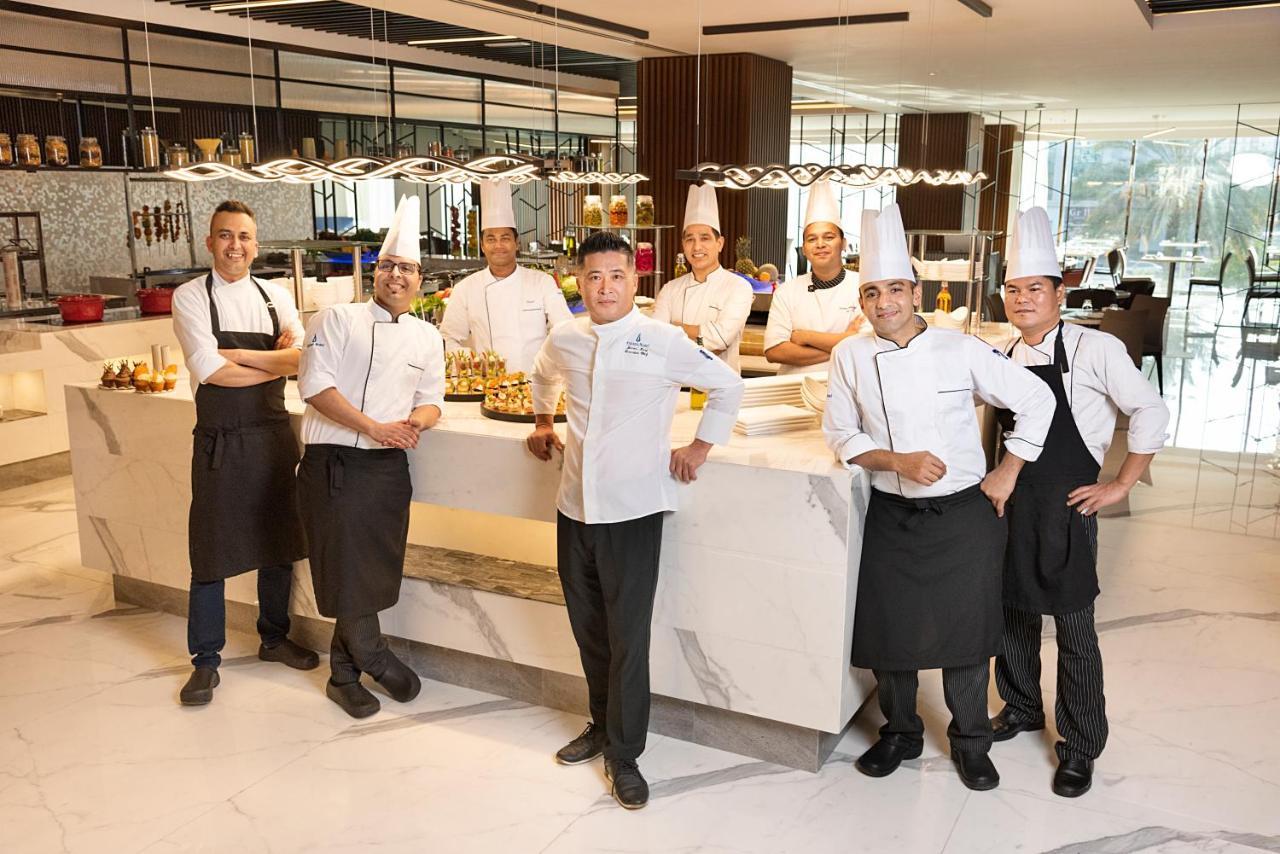 Asiana Grand Hotel Dubai Bagian luar foto Culinary team at the Conrad Dubai